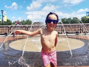 Child with sunglasses at Washington Park Spraygrounds
