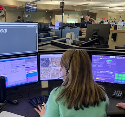 911 call-taker at workstation