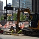 Work in a trench at 5th & Walnut for Duke electrical facility relocation